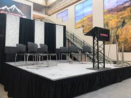Stage with grey carpet